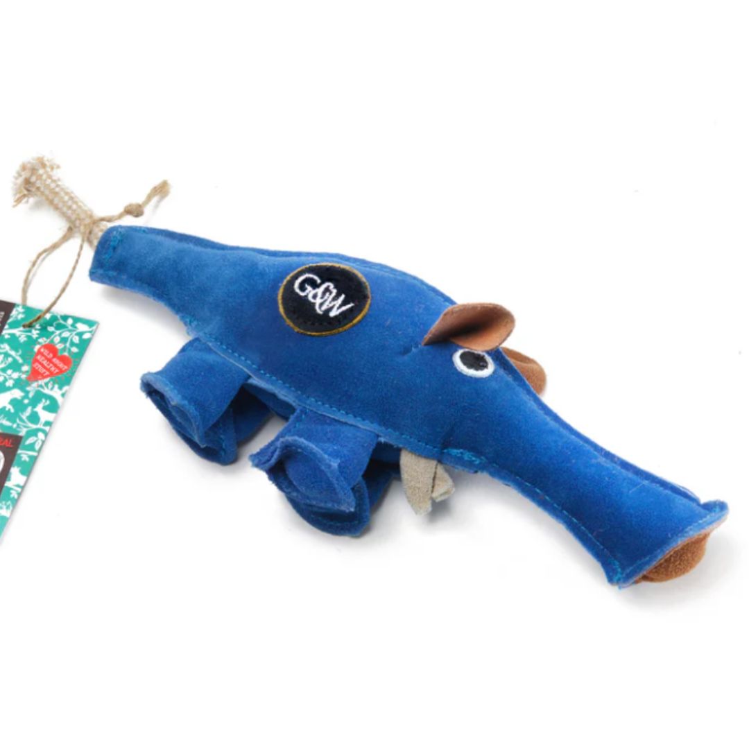 A colour image of a blue dog toy in the shape of an animal with a long snout