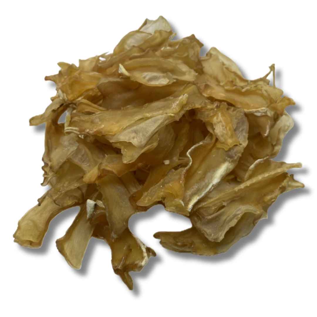 A colour image of pieces of duck breast cartilage natural dog treats.