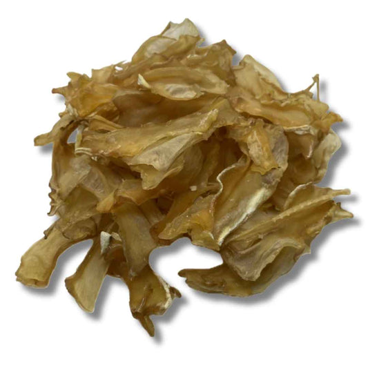 A colour image of pieces of duck breast cartilage natural dog treats.